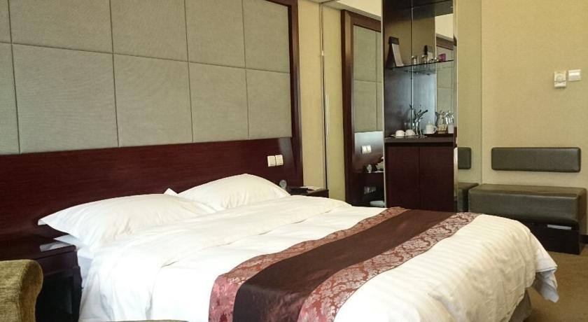 Jin'Gu Hotel Харбин Екстериор снимка