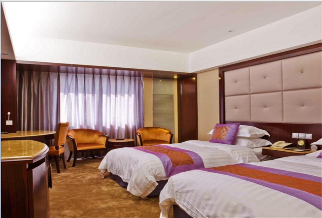 Jin'Gu Hotel Харбин Екстериор снимка