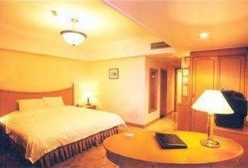 Jin'Gu Hotel Харбин Стая снимка